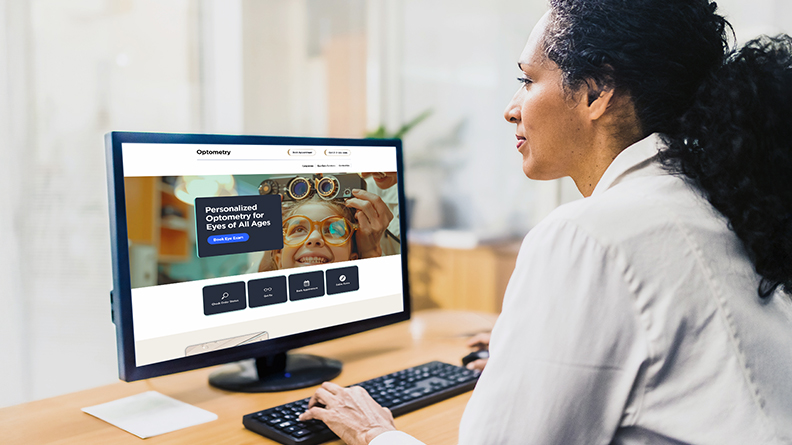 woman looking at her computer